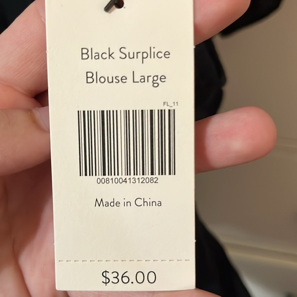 Black V-neck ruffle blouse from the Magnolia store. Size L. Never worn! NWT - Picture 7 of 7